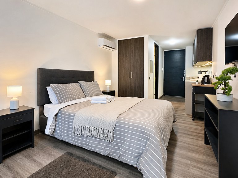 Sleek Santiago Studio | AC, Pool & 24/7 Security